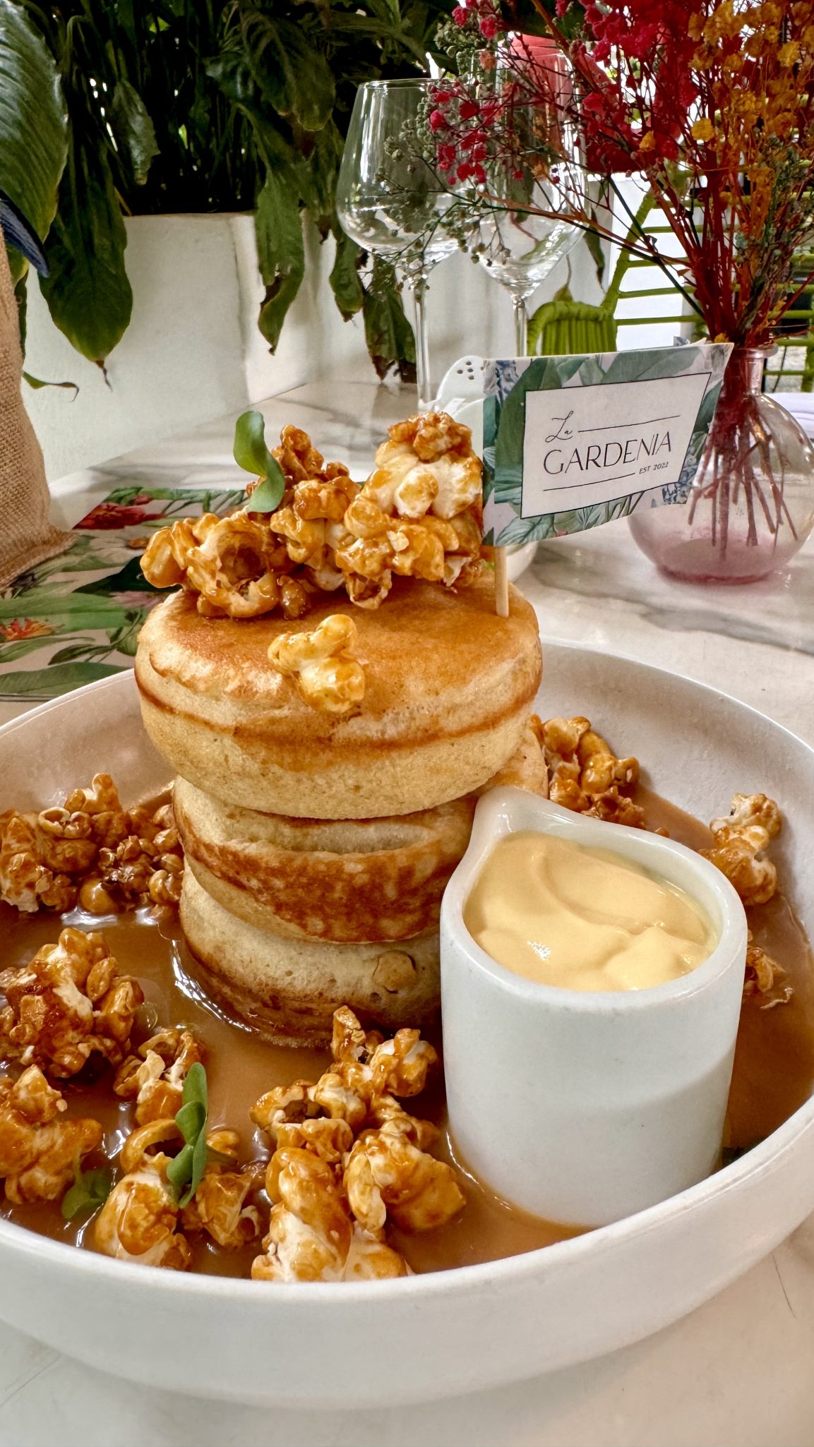 Fluffy pancake with cramelized popcorn and syrup in Ghana restaurant